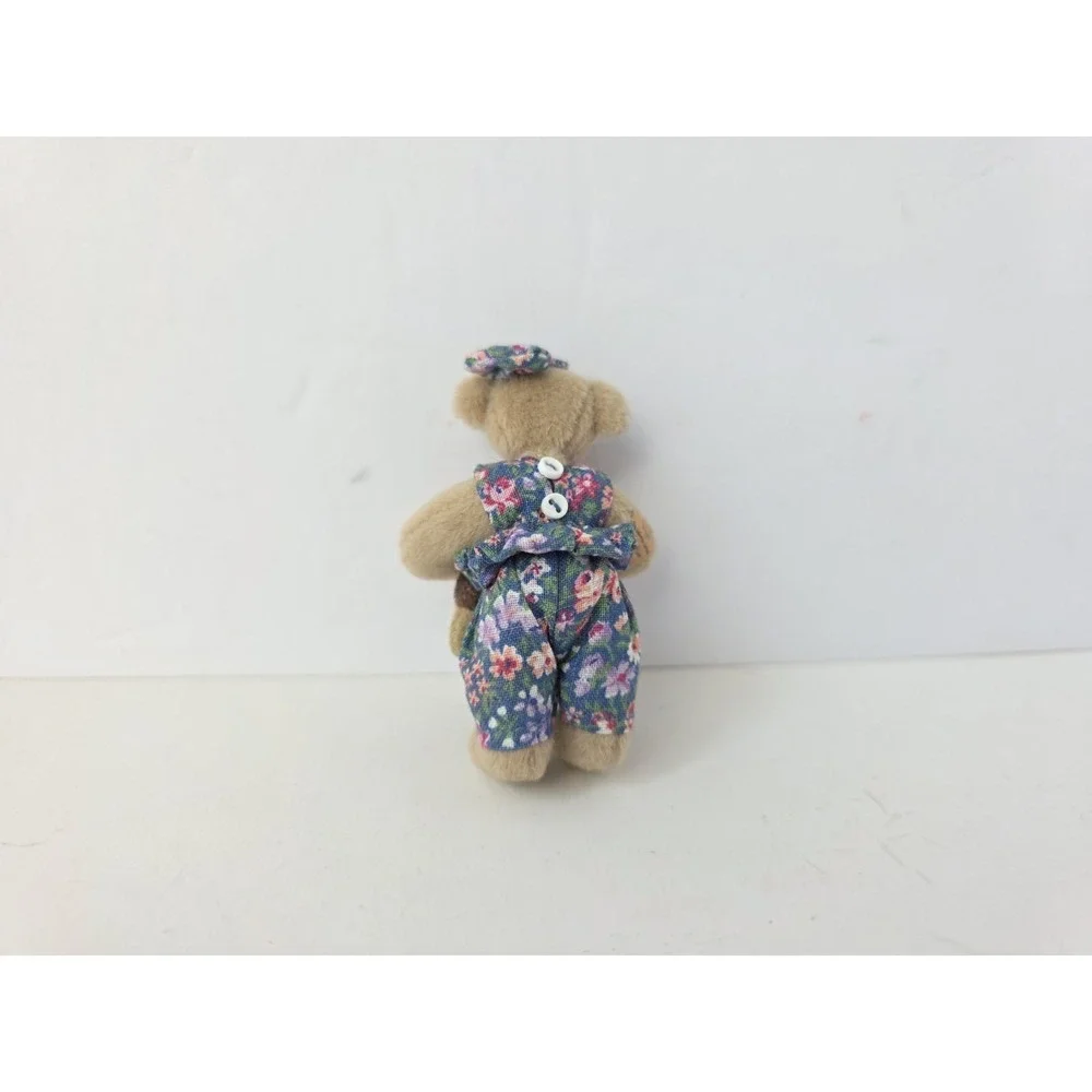 Deb Canham miniature teddy bear Huggle holding monkey